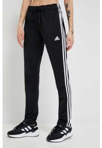 Adidas - adidas spodnie dresowe kolor czarny z aplikacją. Kolor: czarny. Materiał: dresówka. Wzór: aplikacja #4