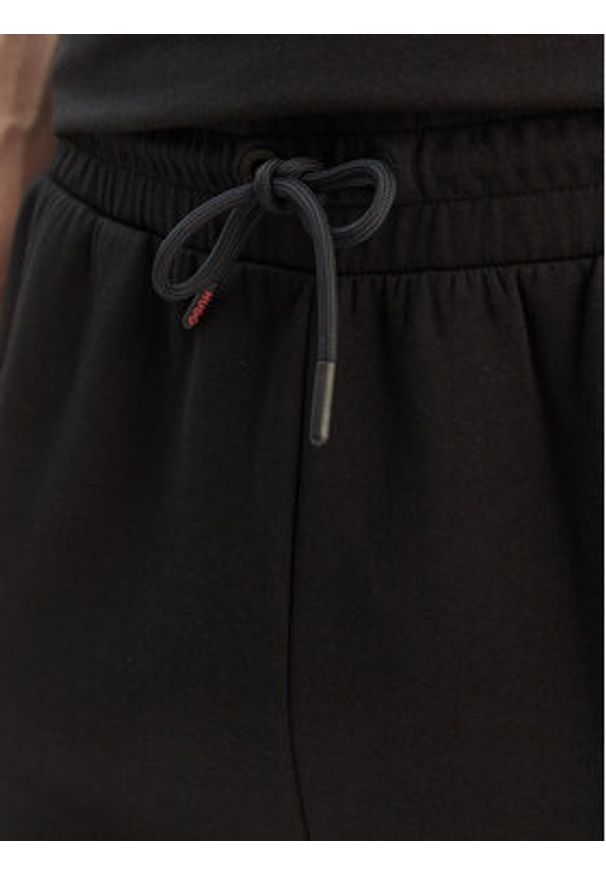 Hugo - HUGO Spodnie dresowe Atlas 50557004 Czarny Regular Fit. Kolor: czarny. Materiał: bawełna