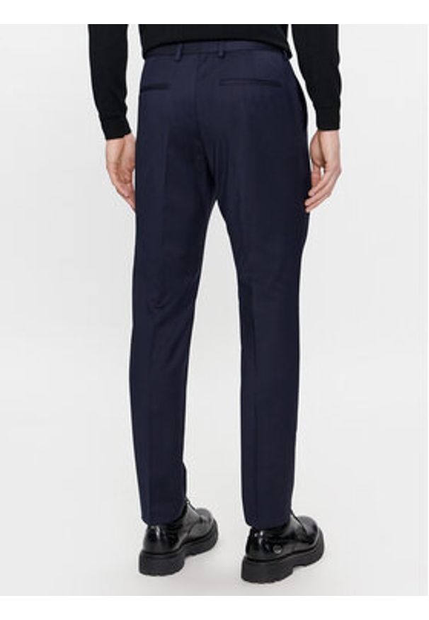 Calvin Klein Chinosy K10K112292 Granatowy Slim Fit. Kolor: niebieski. Materiał: wełna