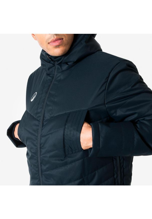 KIPSTA - Długa parka do piłki nożnej Kipsta. Kolor: niebieski. Długość: długie. Sport: piłka nożna