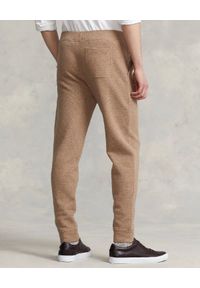 Ralph Lauren - RALPH LAUREN - Beżowe spodnie dresowe Jogger z logo. Kolor: beżowy. Materiał: dresówka. Wzór: haft