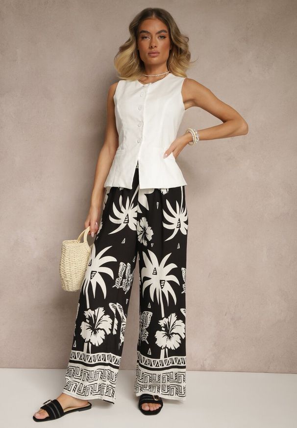 Renee - Czarne Szerokie Spodnie z Gumką w Pasie w Stylu Boho Evirami. Kolor: czarny. Sezon: lato. Styl: boho