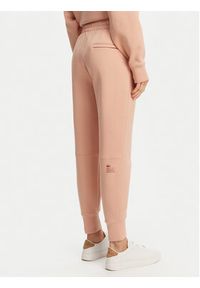 Lacoste Spodnie dresowe XF0343 Pomarańczowy Regular Fit. Kolor: pomarańczowy. Materiał: bawełna
