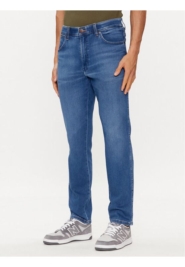 Wrangler Jeansy River 112352673 Niebieski Tapered Fit. Kolor: niebieski