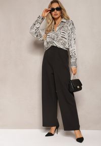 Renee - Beżowo-Czarna Koszula o Luźnym Fasonie w Etno Wzór Goliana. Kolor: beżowy. Styl: etno