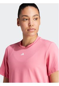 Adidas - adidas Koszulka techniczna Versatile IL1364 Różowy Regular Fit. Kolor: różowy. Materiał: syntetyk