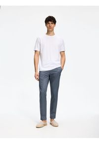 Reserved - Spodnie chino slim fit - granatowy. Kolor: niebieski. Materiał: tkanina, bawełna