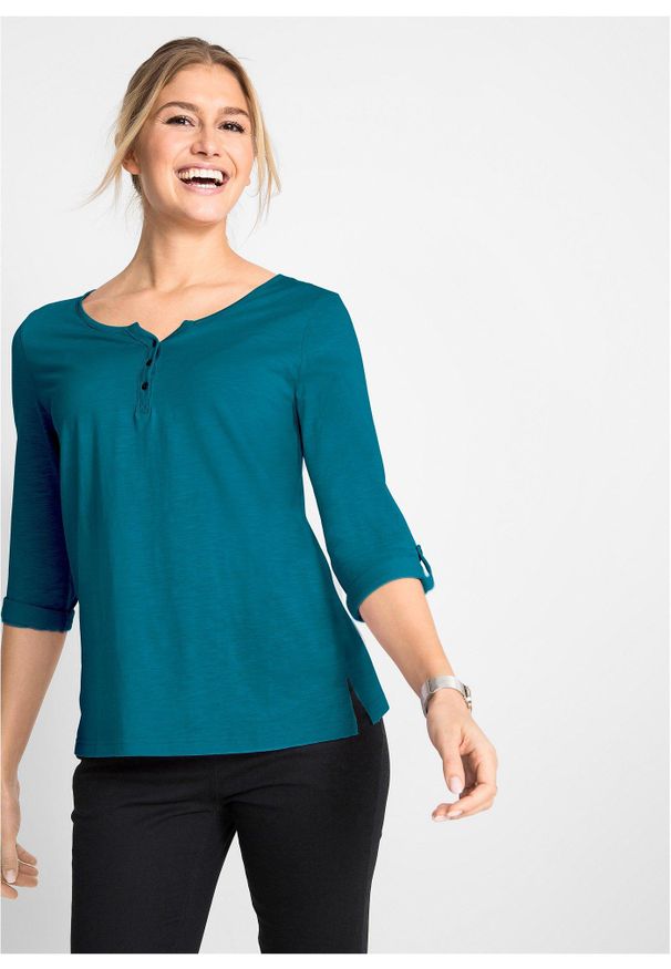 bonprix - Bluzka z plisą guzikową z czystej bawełny organicznej. Typ kołnierza: dekolt w serek. Kolor: niebieski. Materiał: bawełna. Długość rękawa: długi rękaw. Długość: długie