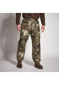 SOLOGNAC - Spodnie zimowe myśliwskie Solognac camo treemetic. Kolor: zielony, brązowy, wielokolorowy. Materiał: materiał. Sezon: zima. Sport: outdoor