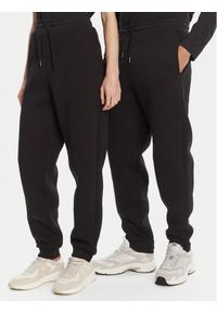AMI PARIS Spodnie dresowe UTR237.749 Czarny Relaxed Fit. Kolor: czarny. Materiał: syntetyk