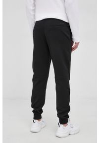 Calvin Klein - Spodnie. Kolor: czarny. Materiał: dzianina