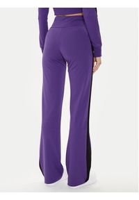 Puma Spodnie dresowe DUA LIPA 536629 Fioletowy Slim Fit. Kolor: fioletowy. Materiał: syntetyk #3
