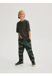 Reserved - Bawełniane spodnie jogger - czarny. Kolor: czarny. Materiał: bawełna #1