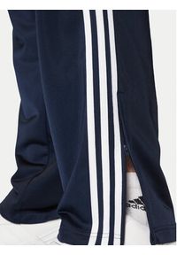 Adidas - adidas Spodnie dresowe adicolor Classics Firebird IM9471 Granatowy Regular Fit. Kolor: niebieski. Materiał: syntetyk #4