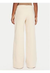 Guess Jeans Spodnie dresowe W5BB04 KC811 Beżowy Wide Leg. Kolor: beżowy. Materiał: bawełna #5