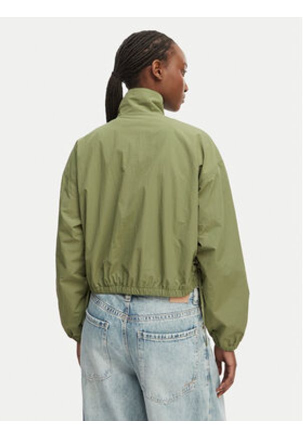 Tommy Jeans Kurtka przejściowa DW0DW22325 Zielony Regular Fit. Kolor: zielony. Materiał: syntetyk