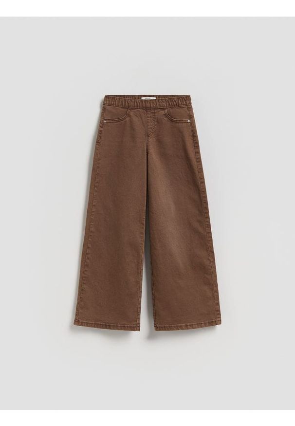 Reserved - Spodnie na gumce - ciemnobrązowy. Kolor: brązowy. Materiał: tkanina, bawełna