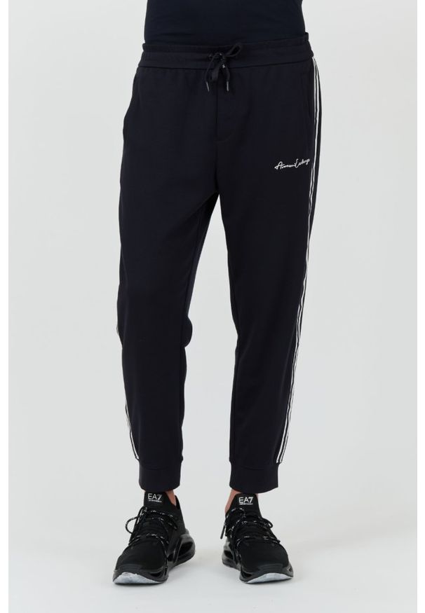 Armani Exchange - ARMANI EXCHANGE Granatowe męskie spodnie dresowe, Rozmiar L. Kolor: niebieski. Materiał: dresówka