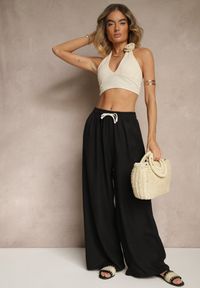 Renee - Czarne Spodnie z Bawełną o Szerokim Kroju High Waist z Wiązaniem Noleldi. Okazja: na co dzień. Stan: podwyższony. Kolor: czarny. Materiał: bawełna. Styl: elegancki, casual