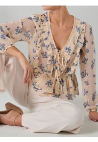 Sinsay - Półprzezroczysta bluzka w kwiatowy wzór - żółty. Kolor: żółty. Wzór: kwiaty #1