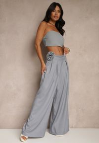 Renee - Niebieskie Spodnie o Szerokim Kroju High Waist z Kwiatem 3D Firalisse. Okazja: na co dzień. Stan: podwyższony. Kolor: niebieski. Wzór: kwiaty. Styl: klasyczny, elegancki, casual #4