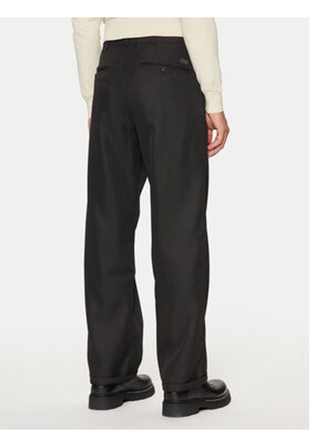 G-Star RAW - G-Star Raw Spodnie materiałowe D25236 6484 Czarny Loose Fit. Kolor: czarny. Materiał: syntetyk
