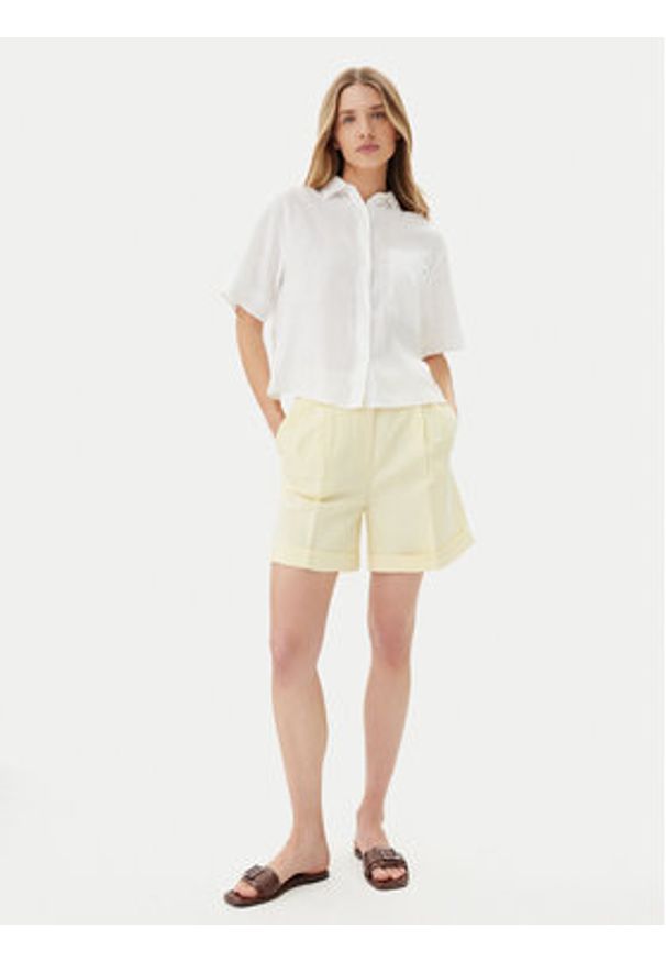 TOMMY HILFIGER - Tommy Hilfiger Szorty materiałowe WW0WW44767 Żółty Regular Fit. Kolor: żółty. Materiał: syntetyk