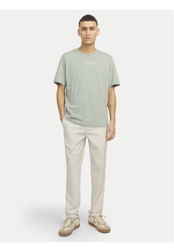 Jack & Jones Chinosy Marco 12193553 Beżowy Slim Fit. Kolor: beżowy. Materiał: syntetyk