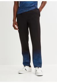 bonprix - Spodnie sportowe. Kolor: czarny. Materiał: materiał. Wzór: nadruk. Styl: sportowy #1