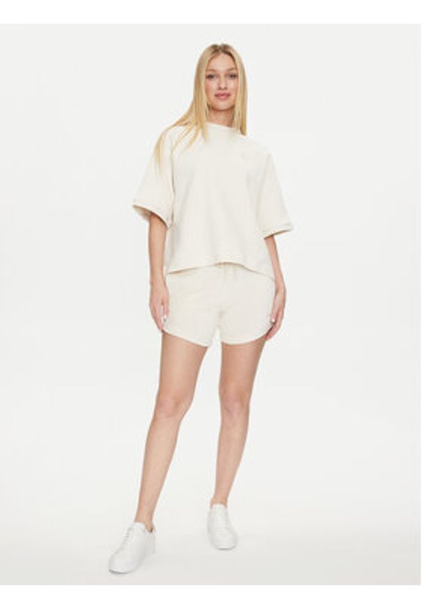 Puma T-Shirt Infuse 624302 Écru Relaxed Fit. Materiał: bawełna