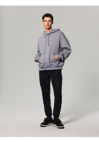 Sinsay - Jeansy jogger cargo z efektem sprania - czarny. Kolor: czarny