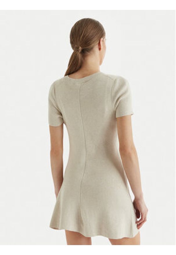 Calvin Klein Jeans Sukienka dzianinowa LV047F325G Beżowy Slim Fit. Kolor: beżowy. Materiał: bawełna