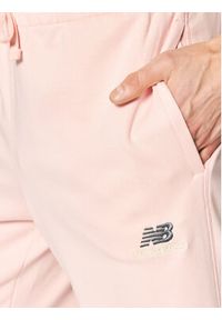 New Balance Spodnie dresowe Unisex UP21500 Różowy Athletic Fit. Kolor: różowy. Materiał: syntetyk