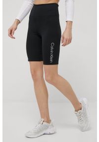 Calvin Klein Performance szorty treningowe CK Essentials damskie kolor czarny z nadrukiem high waist. Stan: podwyższony. Kolor: czarny. Materiał: dzianina, skóra. Wzór: nadruk
