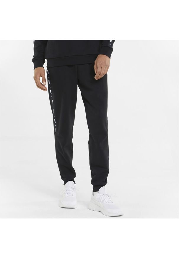 Puma - Męskie spodnie dresowe Essentials+ Tape PUMA Black. Kolor: czarny. Materiał: dresówka. Sport: fitness