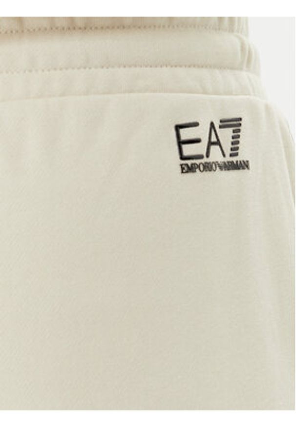 EA7 Emporio Armani Spodnie dresowe 7W000106 AF12473 U1079 Beżowy Loose Fit. Kolor: beżowy. Materiał: bawełna