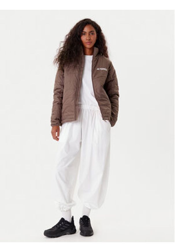 Adidas - adidas Kurtka outdoor Terrex Multi JN0812 Brązowy Regular Fit. Kolor: brązowy. Materiał: syntetyk. Sport: outdoor