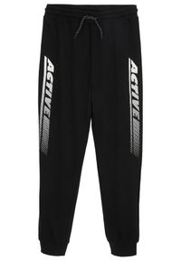 bonprix - Spodnie dresowe z miękkiej mieszanki bawełny. Kolor: czarny. Materiał: bawełna, dresówka, materiał #1