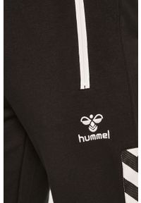 Hummel - Spodnie. Kolor: czarny. Materiał: bawełna, poliester, dzianina, elastan. Wzór: gładki #2