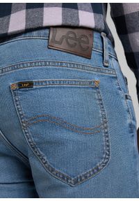 Lee - LEE RIDER MĘSKIE SPODNIE JEANSOWE LIGHT WORN L701SQBH 112319709