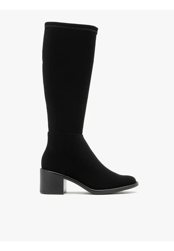 Ryłko - Elastyczne kozaki z szeroką cholewką. Nosek buta: okrągły. Zapięcie: zamek. Kolor: czarny. Materiał: syntetyk. Szerokość cholewki: szeroka. Obcas: na obcasie. Styl: street. Wysokość obcasa: średni