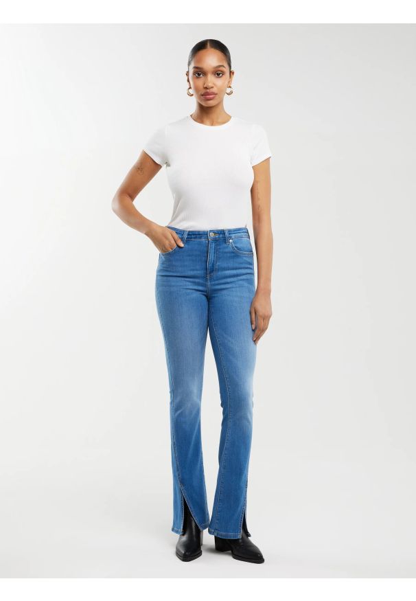 Big-Star - Jeansy damskie bootcut z rozcięciami niebieskie Blake 402. Stan: podwyższony. Kolor: niebieski. Styl: elegancki