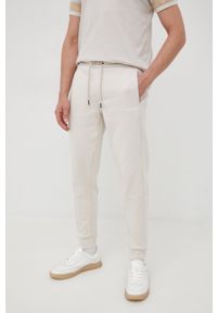 Calvin Klein spodnie męskie kolor beżowy gładkie. Kolor: beżowy. Wzór: gładki #3