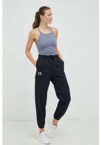 Under Armour spodnie dresowe damskie kolor czarny gładkie. Stan: podwyższony. Kolor: czarny. Materiał: dresówka. Wzór: gładki #3