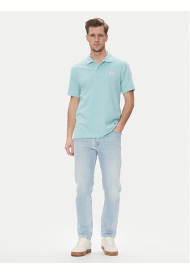 Calvin Klein Jeans Polo J30J327040 Błękitny Regular Fit. Typ kołnierza: polo. Kolor: niebieski. Materiał: bawełna