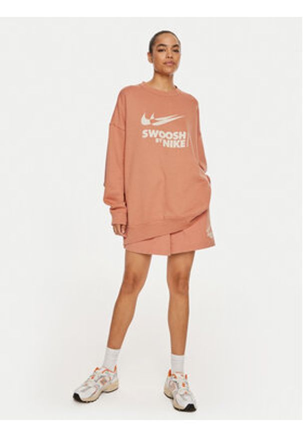 Nike Szorty sportowe HF5529 Brązowy Regular Fit. Kolor: brązowy. Materiał: syntetyk