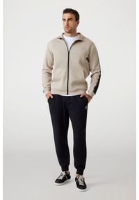 Guess - GUESS Beżowa bluza męska z lampasami Mickey, Rozmiar XL. Kolor: beżowy