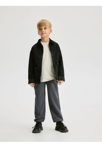 Reserved - Bawełniane spodnie jogger - granatowy. Kolor: niebieski. Materiał: bawełna #1