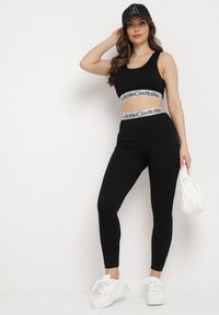 Born2be - Czarne Elastyczne Legginsy z Szeroką Gumą w Pasie Rindama. Kolor: czarny. Materiał: guma. Styl: sportowy #5
