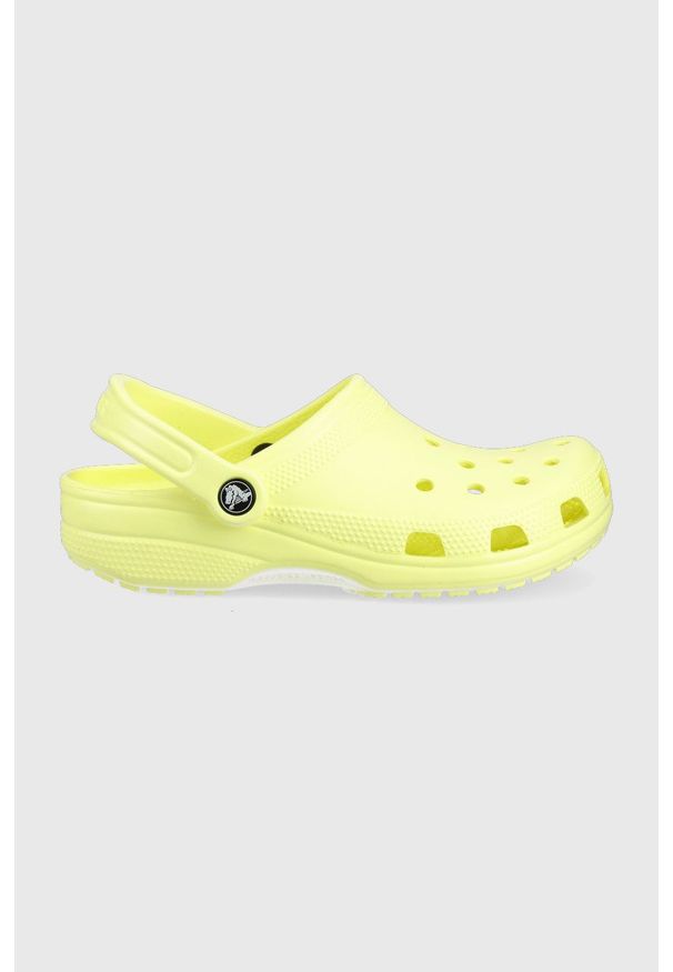 Crocs klapki damskie kolor żółty. Kolor: żółty. Materiał: materiał. Wzór: gładki. Obcas: na obcasie. Wysokość obcasa: niski